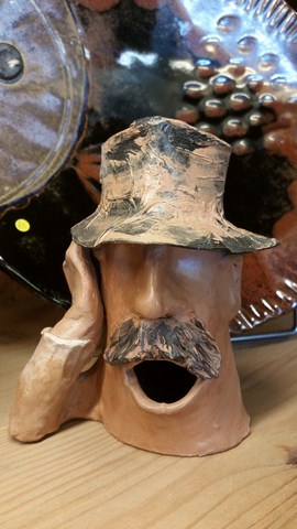 statuettes corse tête en argile